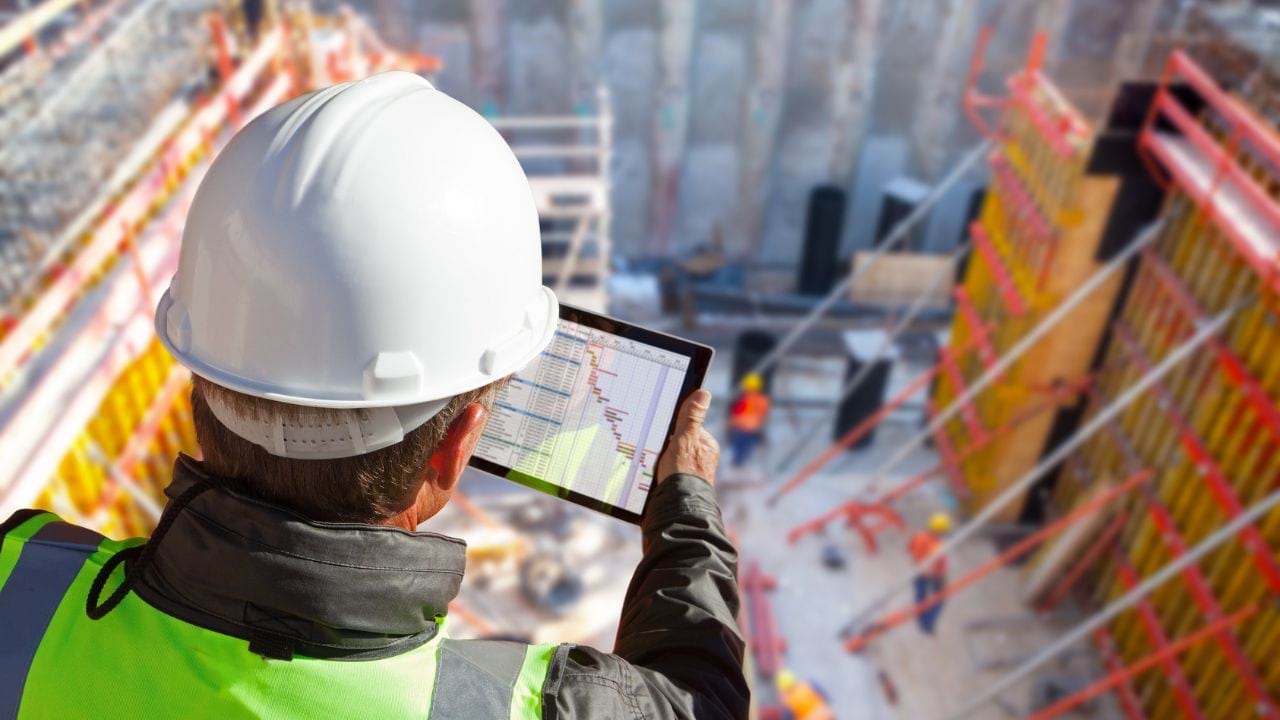 Construction worker looking over a construction site